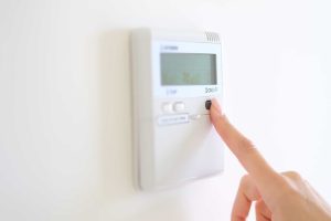 What Does Hold Mean on Thermostat