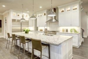 White kitchen design in a new luxurious home