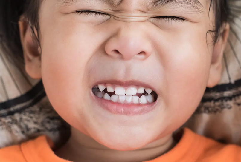 Why Do Kids Grind Their Teeth at Night? Causes Explained 2026
