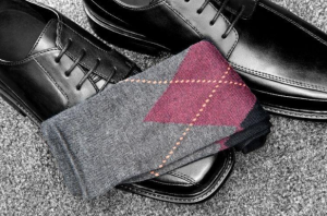Black leather shoes with Argyle socks