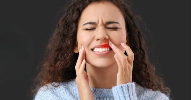 Why Does My Front Tooth Hurt? Causes, Relief, and When to See a Dentist 2026